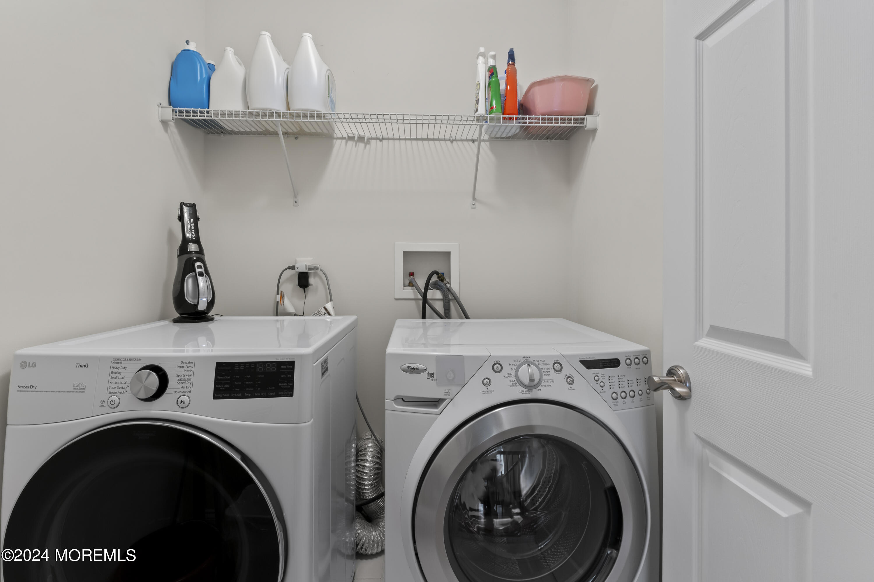 1588 West Front Street Lincroft, NJ 07738 - Photo 35 of 50 a utility room with dryer and washer