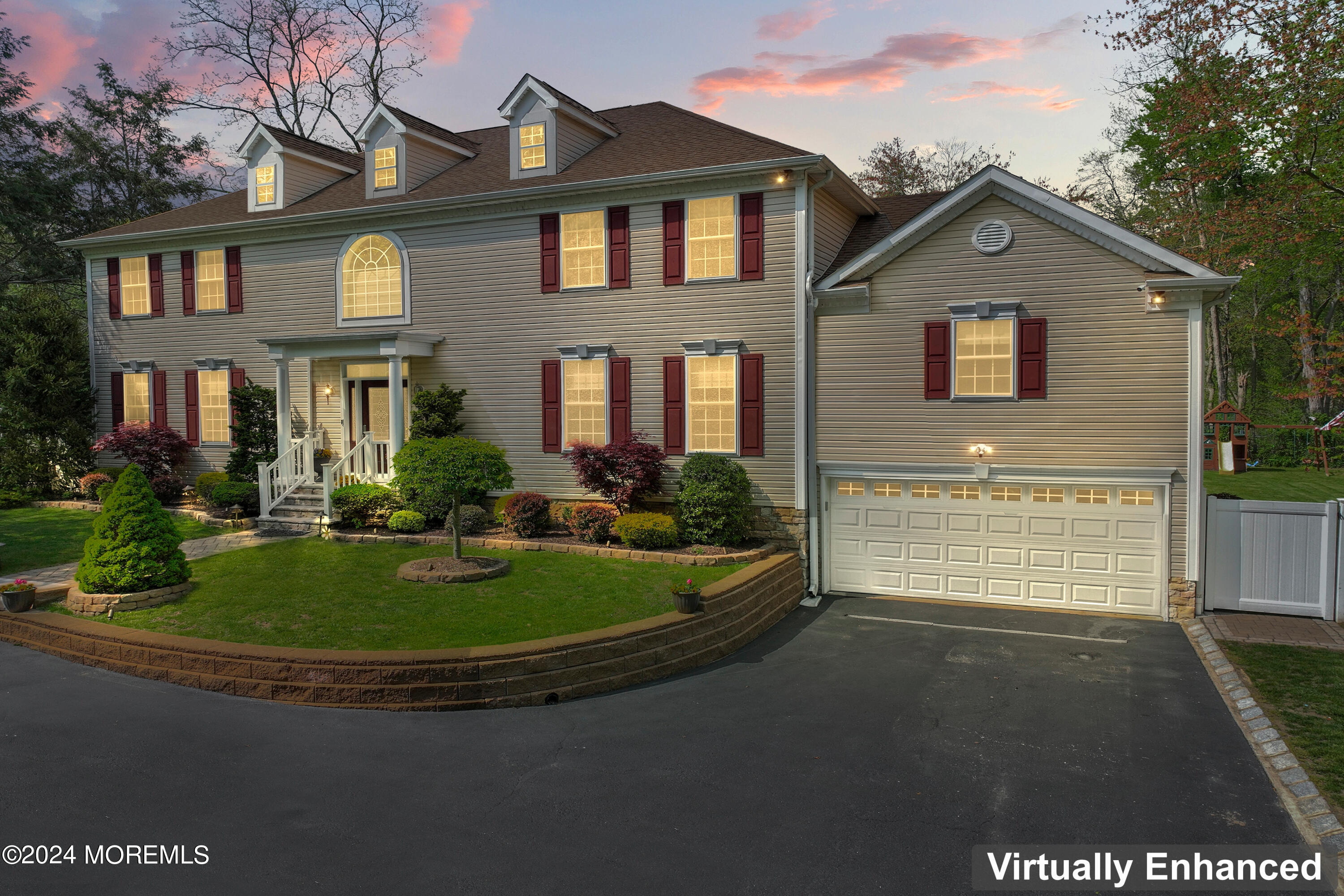 1588 West Front Street Lincroft, NJ 07738 - Photo 49 of 50 a front view of a house with garden