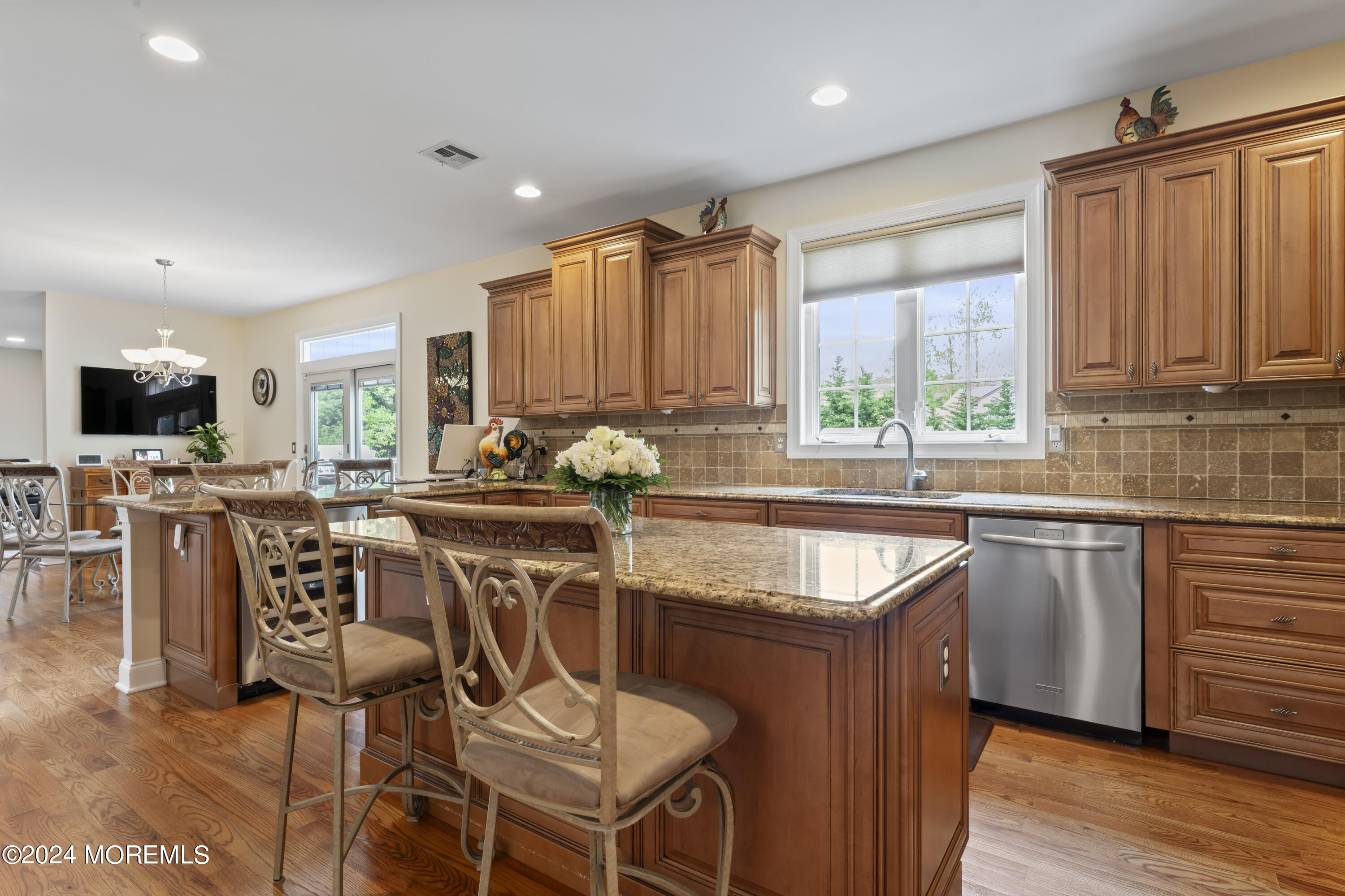 1588 West Front Street Lincroft, NJ 07738 - Photo 10 of 50 a kitchen with granite countertop lots of counter top space and windows