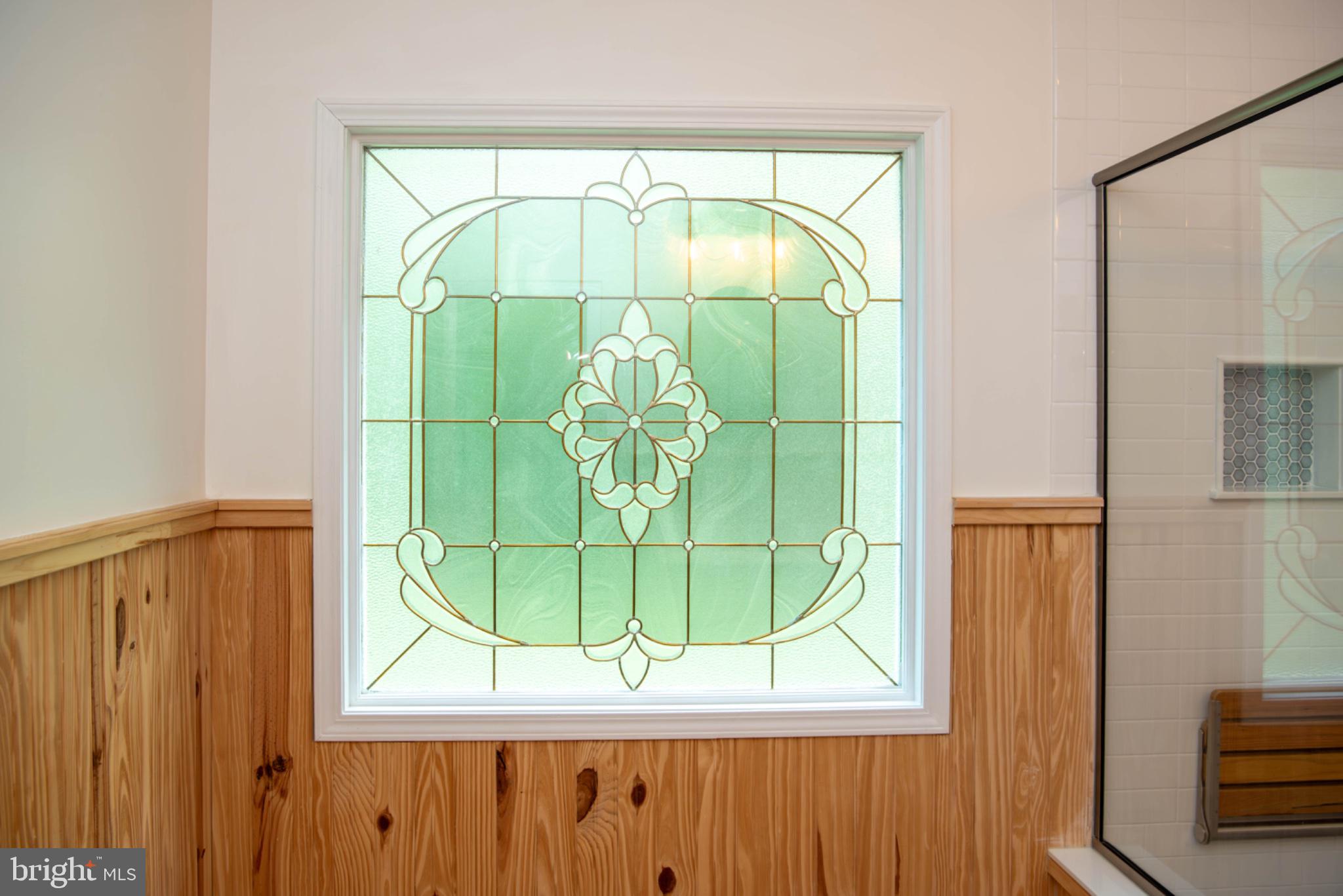 792 Forest Glen Road Moorefield, WV 26836 - Photo 63 of 146 Elegant stained glass window detail.