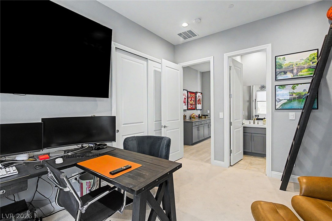 6014 Willow Ridge Court Las Vegas, NV 89135 - Photo 60 of 99 This versatile space features practical built-in storage and convenient access to an adjacent bathroom.