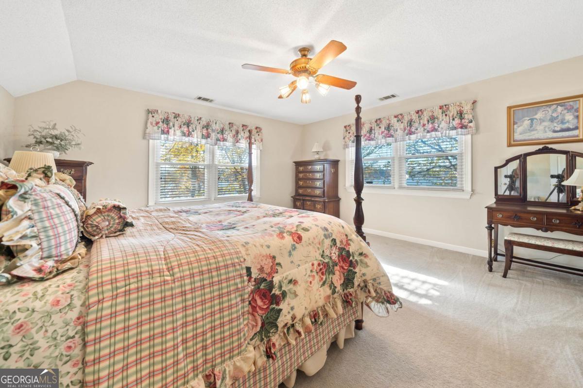 390 David Williams Road Sparta, GA 31087 - Photo 47 of 73 a bedroom with a bed and a large window