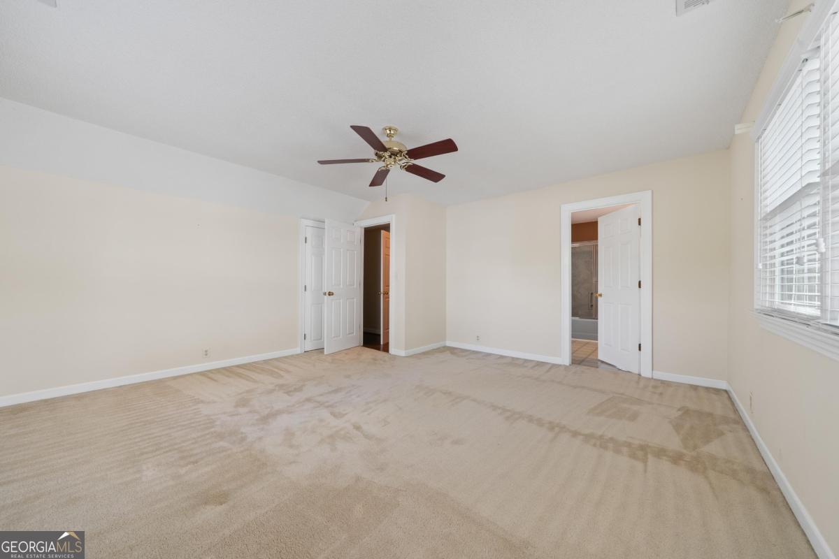 390 David Williams Road Sparta, GA 31087 - Photo 55 of 73 a view of a livingroom with a ceiling fan