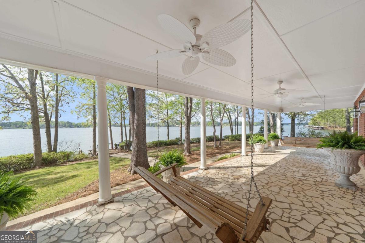 390 David Williams Road Sparta, GA 31087 - Photo 62 of 73 a view of a porch with furniture and garden
