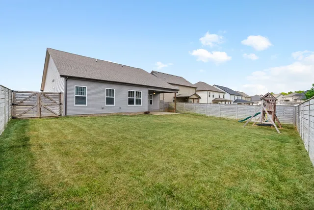 a house view with a garden space