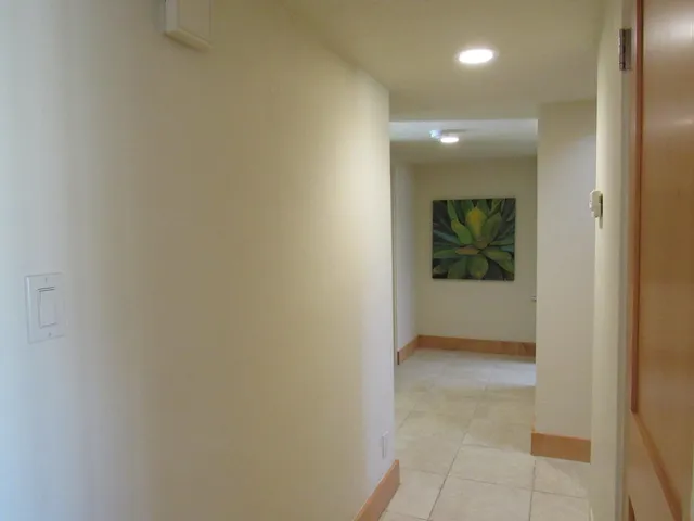 a bed room with a bed and a window