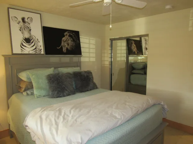 a bathroom with a shower and a sink