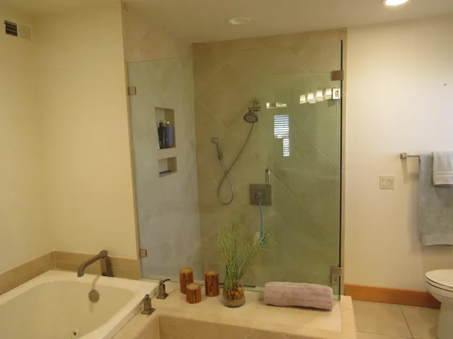 a view of a lake with a table and chairs