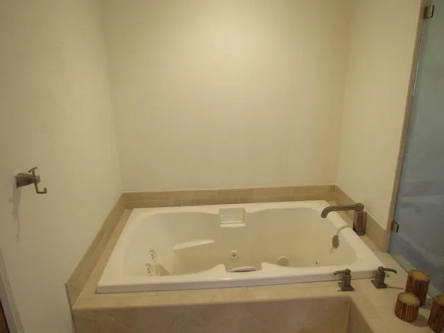 a view of a park with large trees