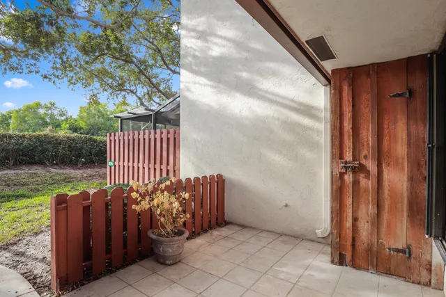a view of a porch with a bench