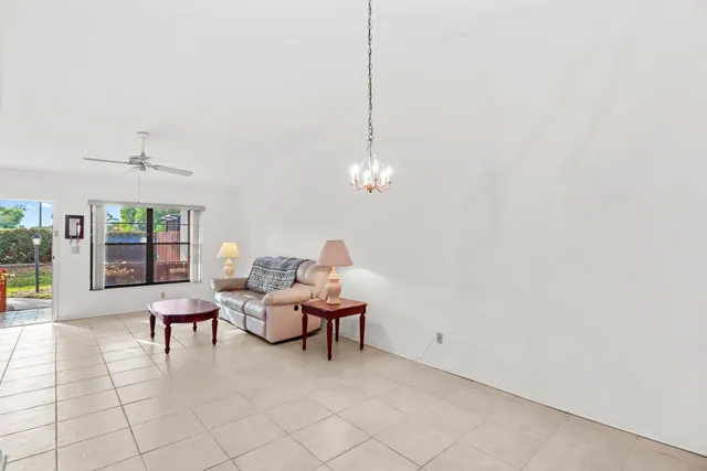 a lobby with furniture and window