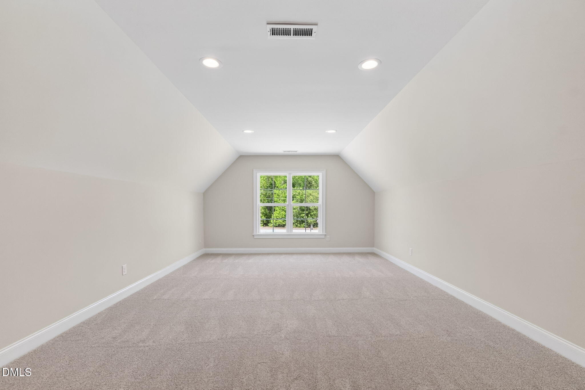 651 Dixon Road, Unit (LOT 2A) Willow Spring, NC 27592 - Photo 56 of 77 an empty room with windows