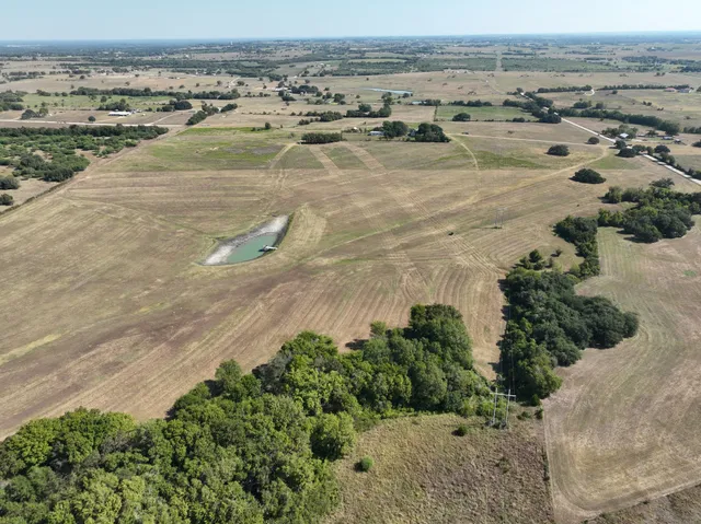an aerial view of ocean and beach