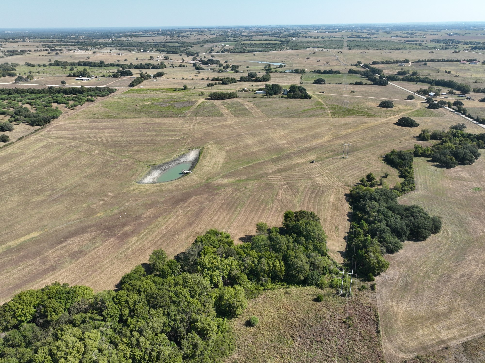 an aerial view of ocean and beach