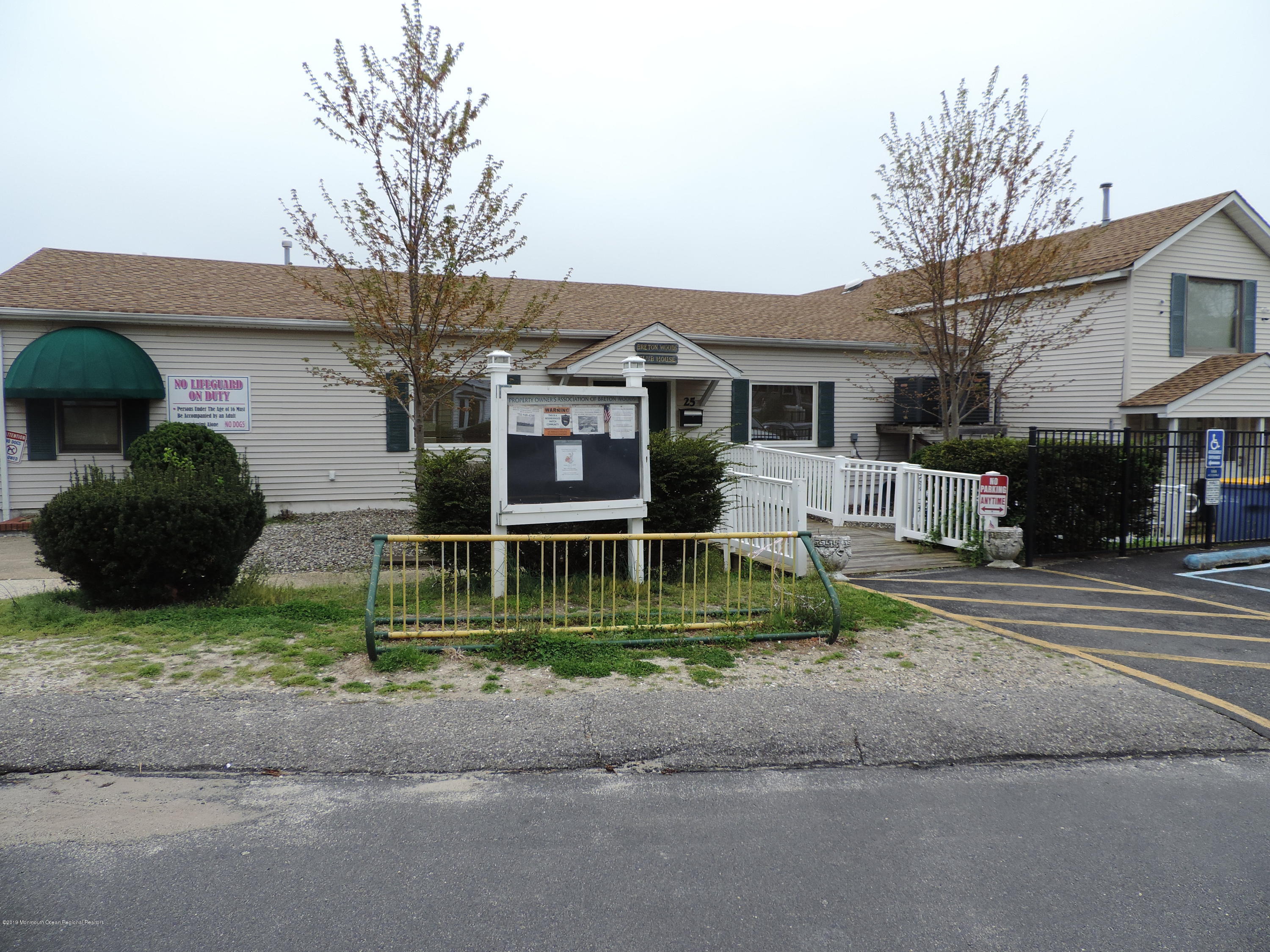 145 Breton Road Brick, NJ 08723 - Photo 29 of 33 a front view of a house with a garden and plants