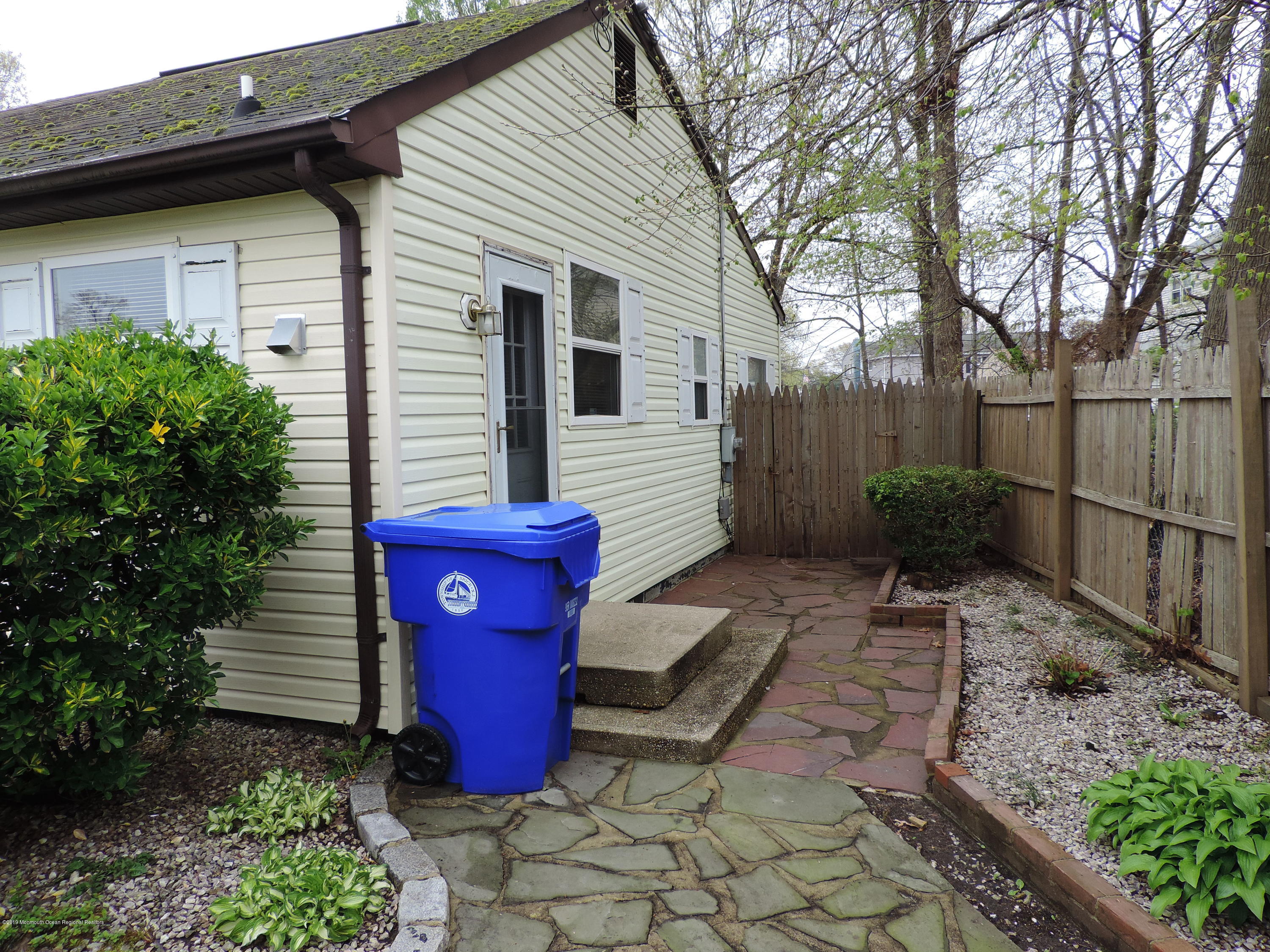 145 Breton Road Brick, NJ 08723 - Photo 4 of 33 a view of a porch with furniture and plants