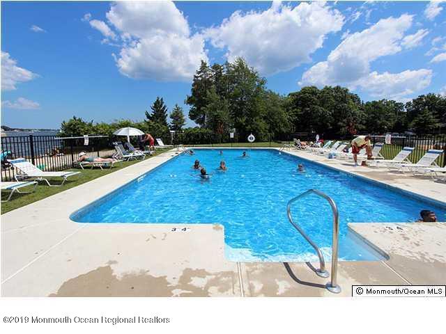 145 Breton Road Brick, NJ 08723 - Photo 33 of 33 a view of a swimming pool with an outdoor seating