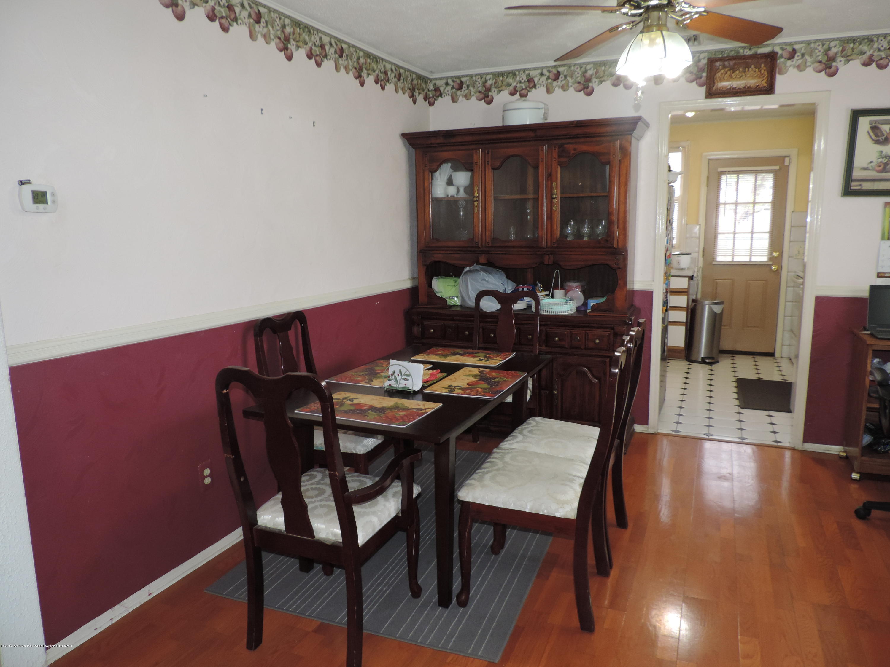145 Breton Road Brick, NJ 08723 - Photo 9 of 33 a view of a dining room with furniture and wooden floor