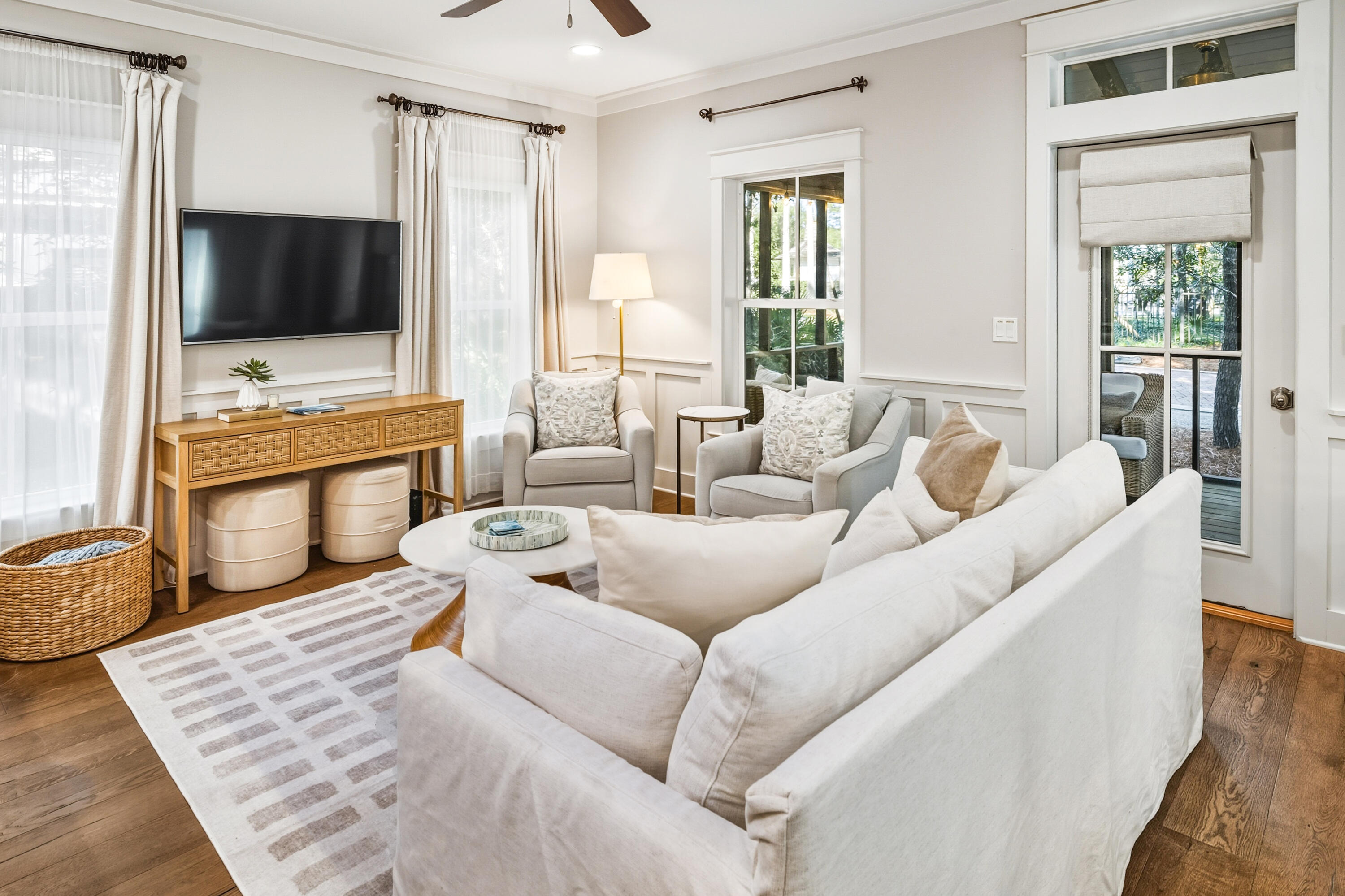 587 Patina Blvd Inlet Beach Inlet Beach, FL 32461 - Photo 11 of 52 a living room with furniture and a flat screen tv