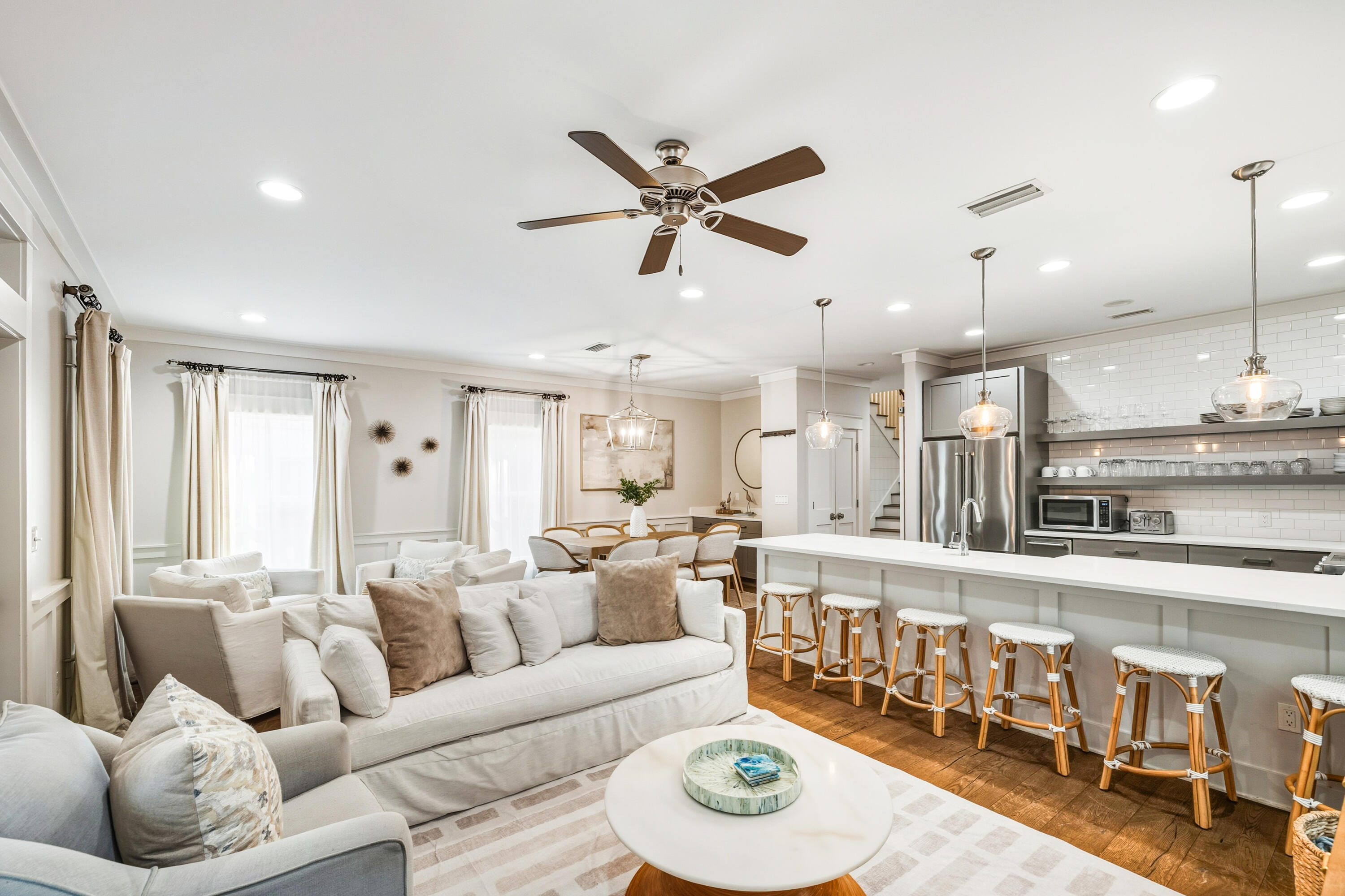 587 Patina Blvd Inlet Beach Inlet Beach, FL 32461 - Photo 14 of 52 a living room with furniture kitchen view and a chandelier