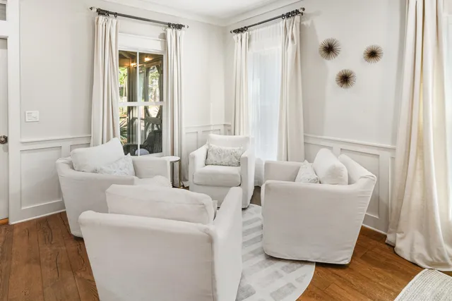 a kitchen with a sink stainless steel appliances and white cabinets