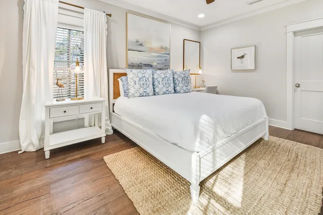 a bathroom with a double vanity sink toilet and shower