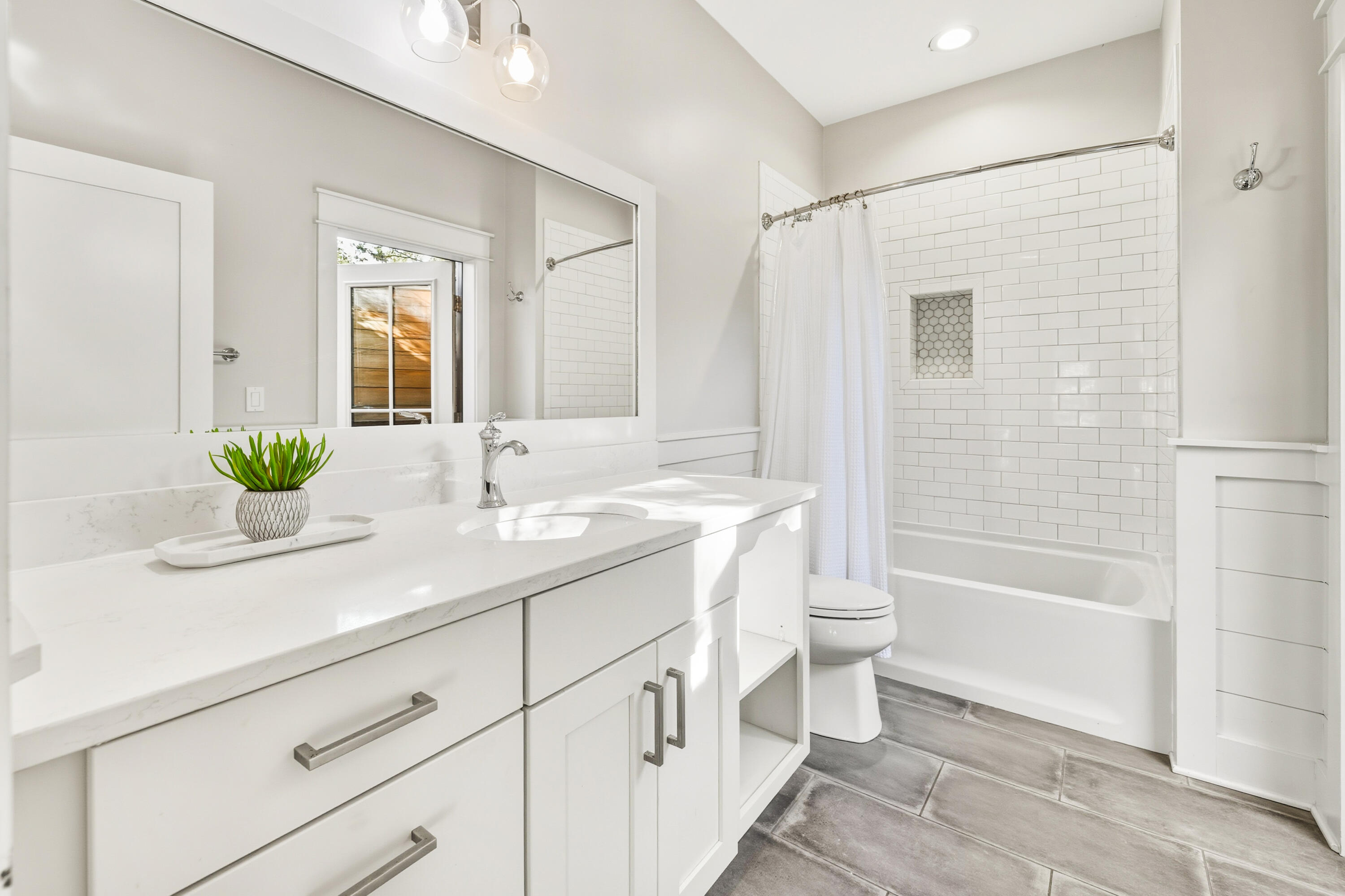 587 Patina Blvd Inlet Beach Inlet Beach, FL 32461 - Photo 27 of 52 a bathroom with a double vanity sink toilet and shower