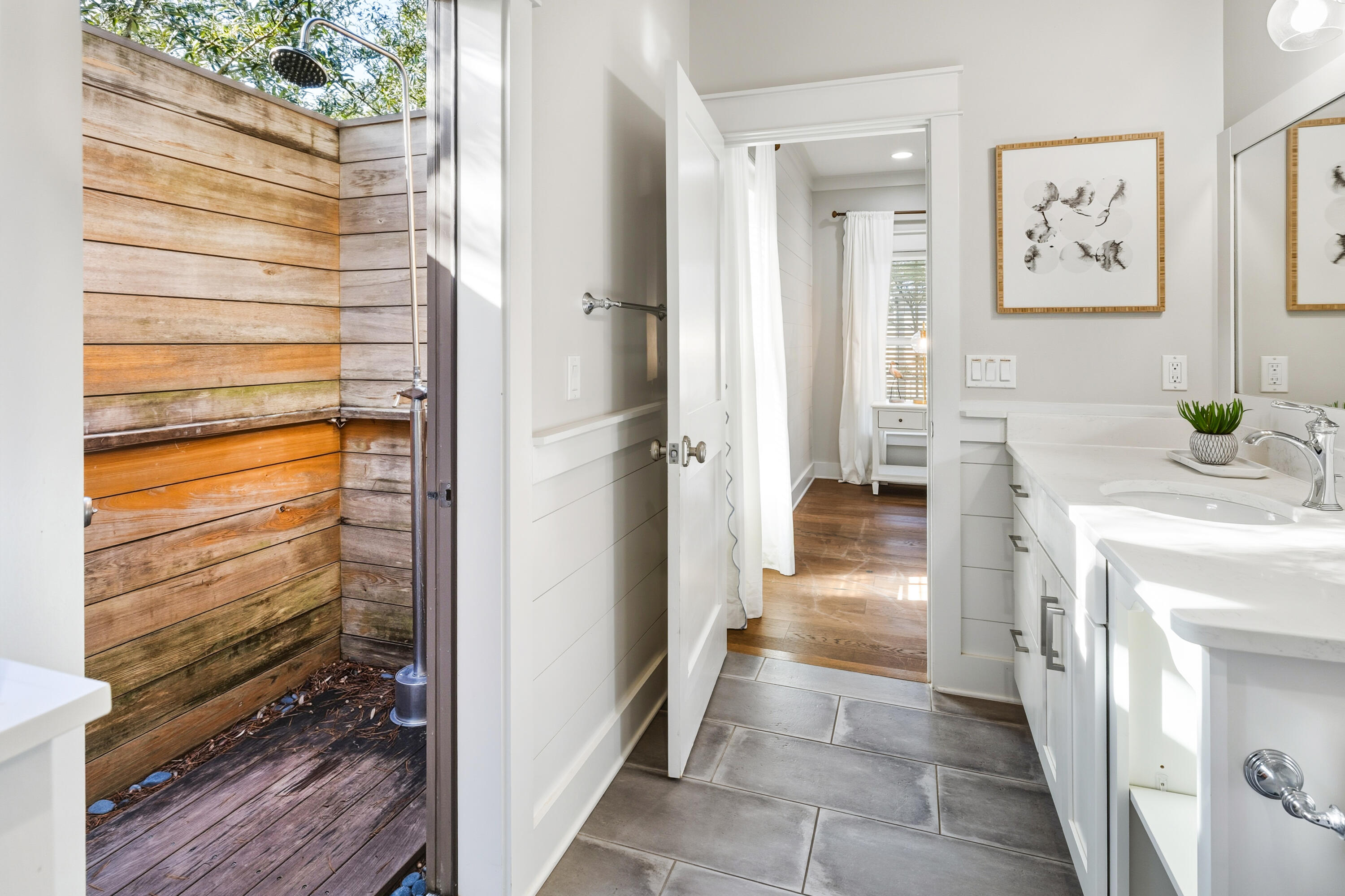 587 Patina Blvd Inlet Beach Inlet Beach, FL 32461 - Photo 28 of 52 a bathroom with a sink and a mirror