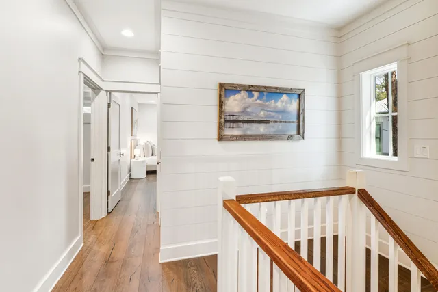 a bedroom with a bed and ceiling fan