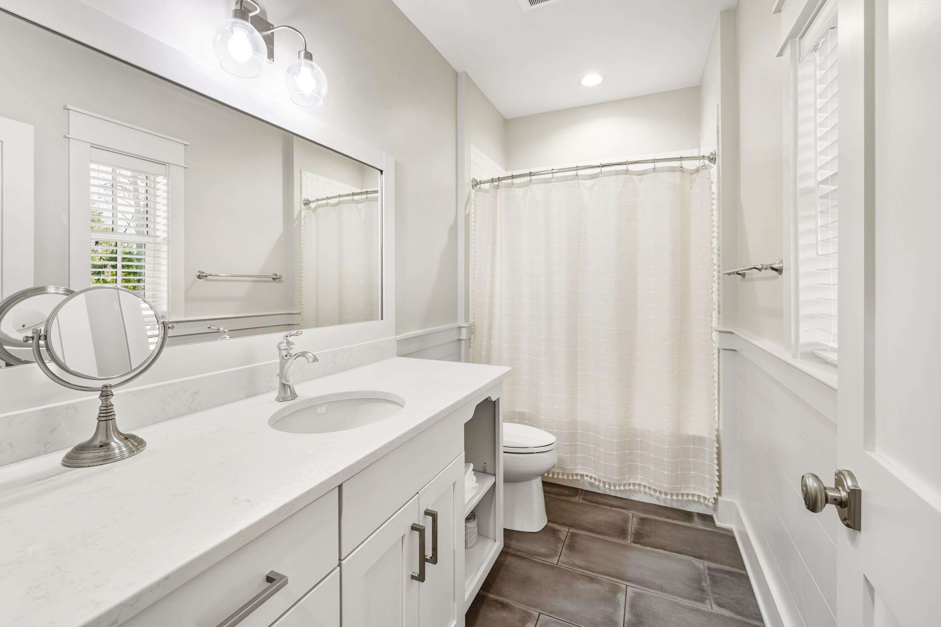 587 Patina Blvd Inlet Beach Inlet Beach, FL 32461 - Photo 33 of 52 a bathroom with a sink a toilet and shower