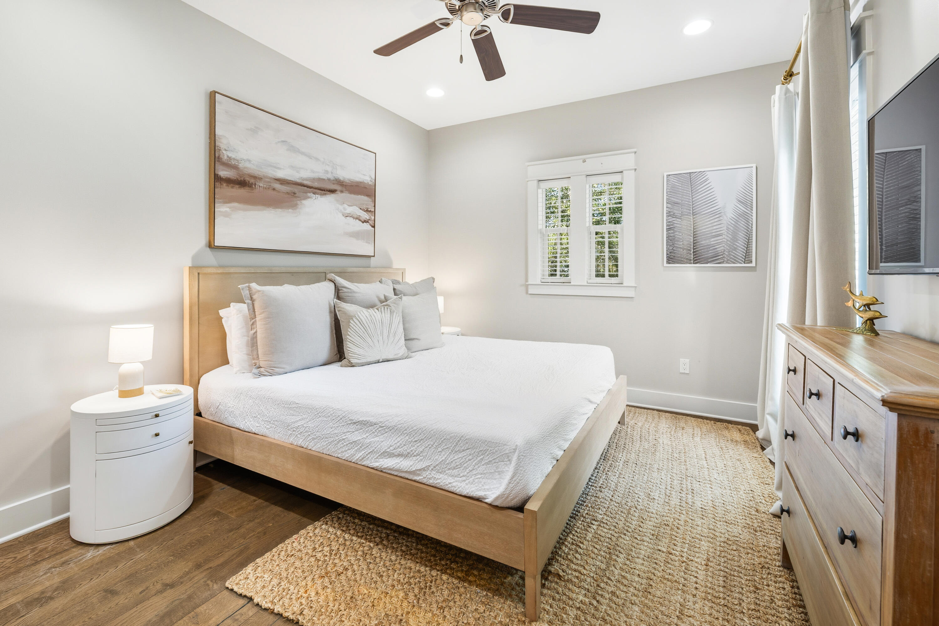 587 Patina Blvd Inlet Beach Inlet Beach, FL 32461 - Photo 34 of 52 a bedroom with a large bed and a chandelier