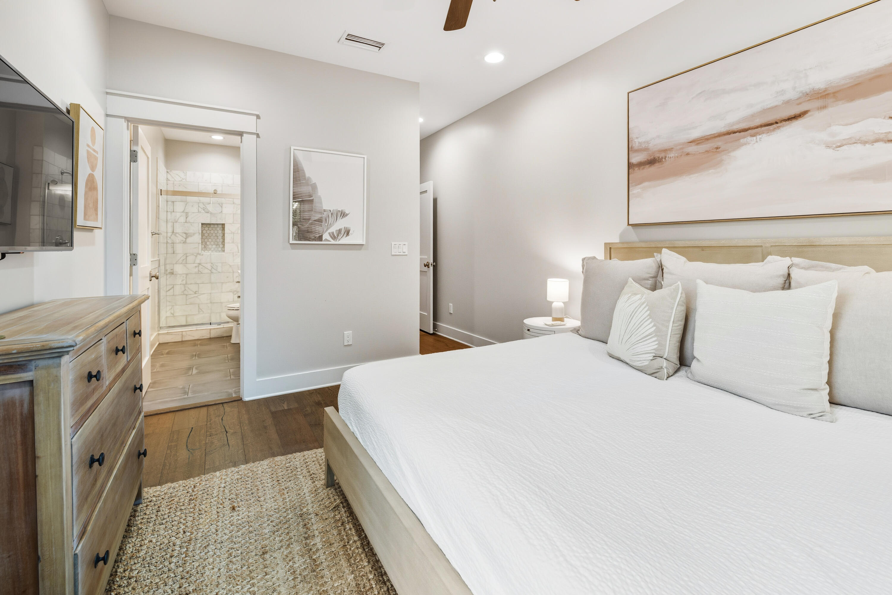 587 Patina Blvd Inlet Beach Inlet Beach, FL 32461 - Photo 36 of 52 a spacious bedroom with a double vanity sink and a mirror