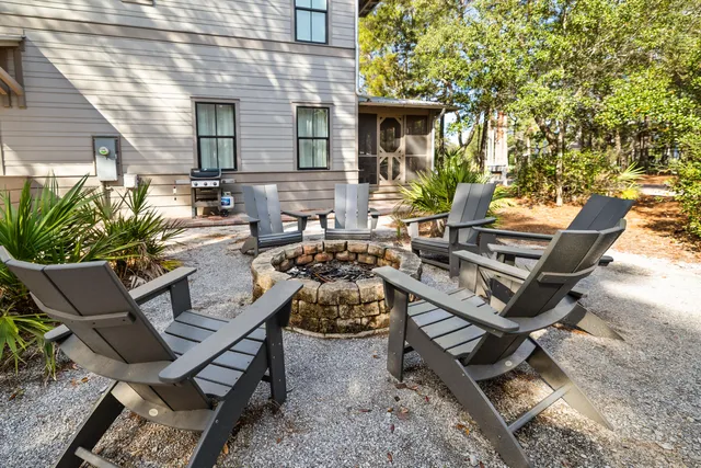 a view of a two chairs in the patio