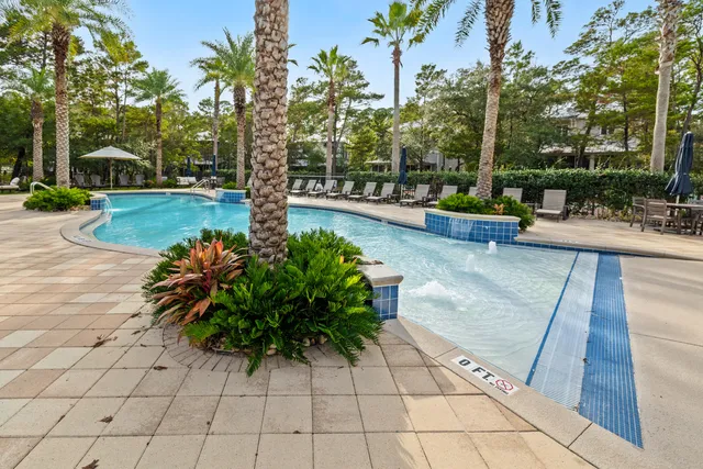 a sign board with parking space