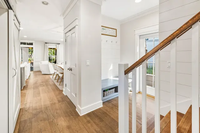 a kitchen with stainless steel appliances granite countertop a table and chairs