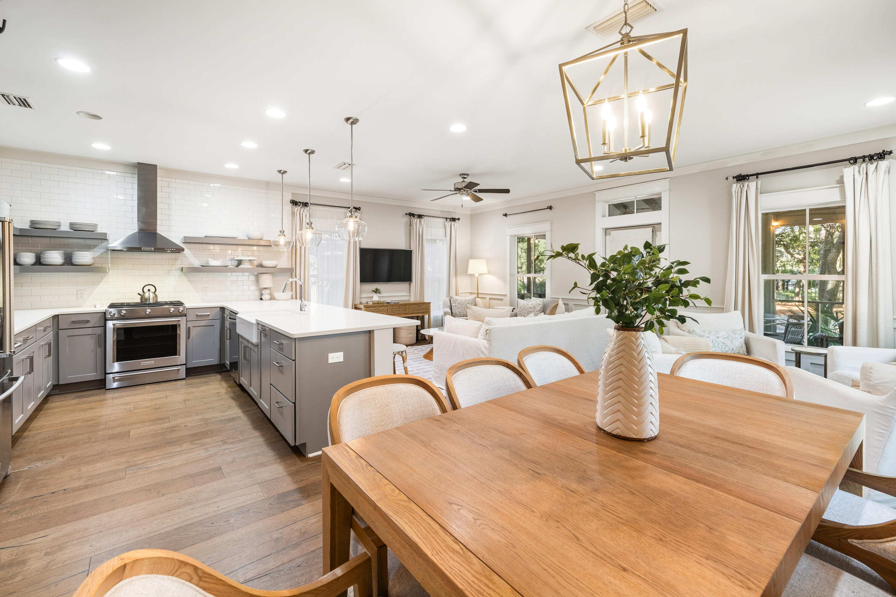 587 Patina Blvd Inlet Beach Inlet Beach, FL 32461 - Photo 8 of 52 a kitchen with stainless steel appliances granite countertop a table and chairs