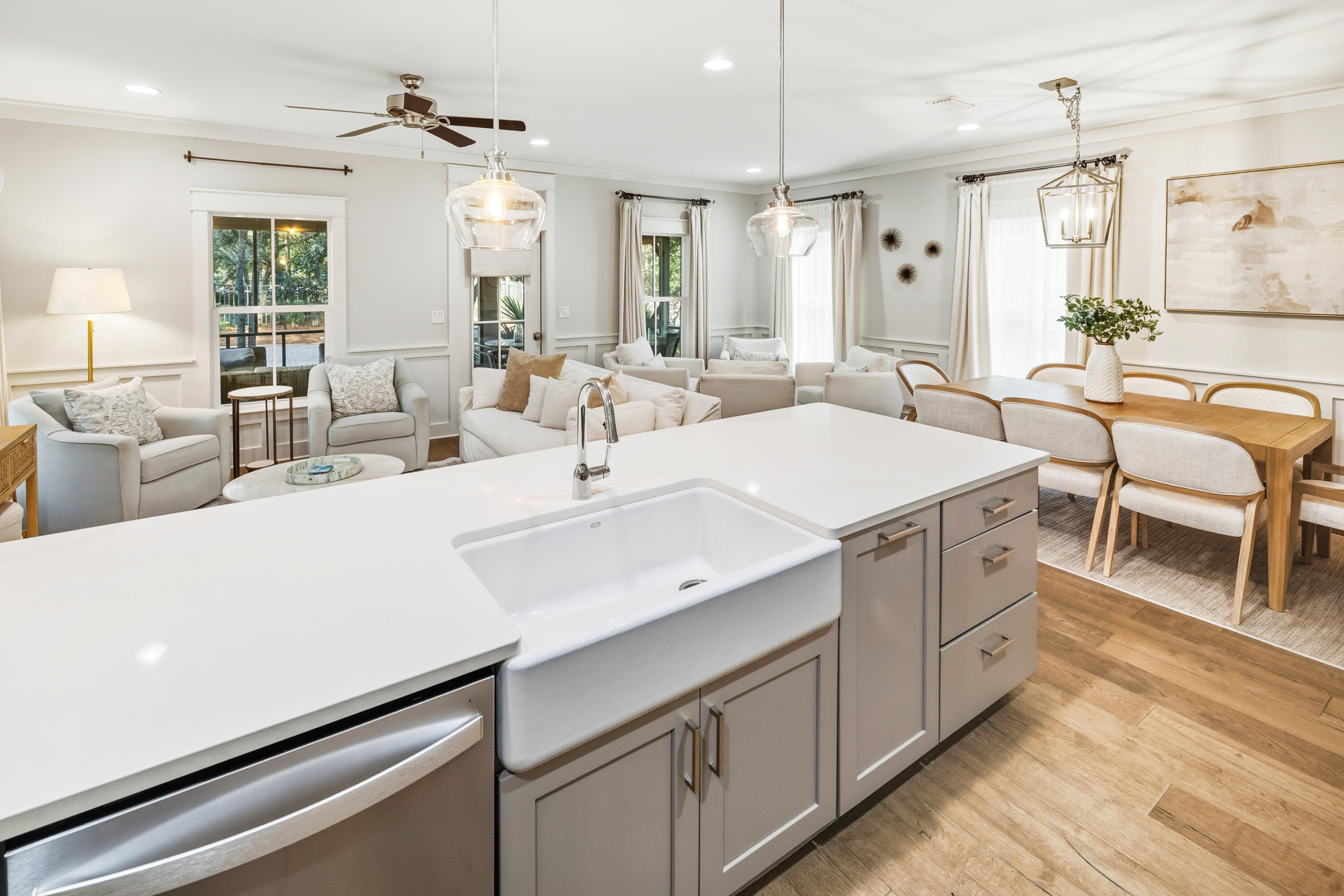 587 Patina Blvd Inlet Beach Inlet Beach, FL 32461 - Photo 10 of 52 a view of a kitchen counter space a sink wooden floor and furniture