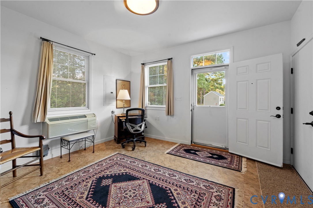 2515 Fleet's Bay Road White Stone, VA 22578 - Photo 57 of 74 a living room with furniture and a window
