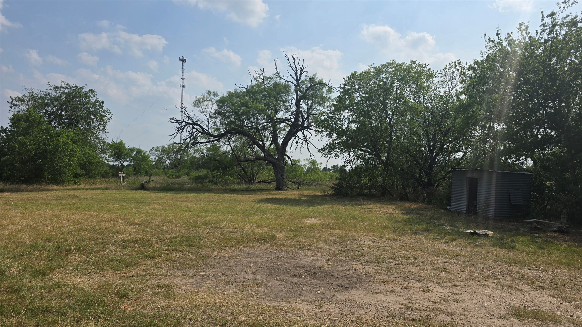 18327 Blake Manor Road, Unit A Manor, TX 78653 - Photo 21 of 21 View of yard featuring a storage shed