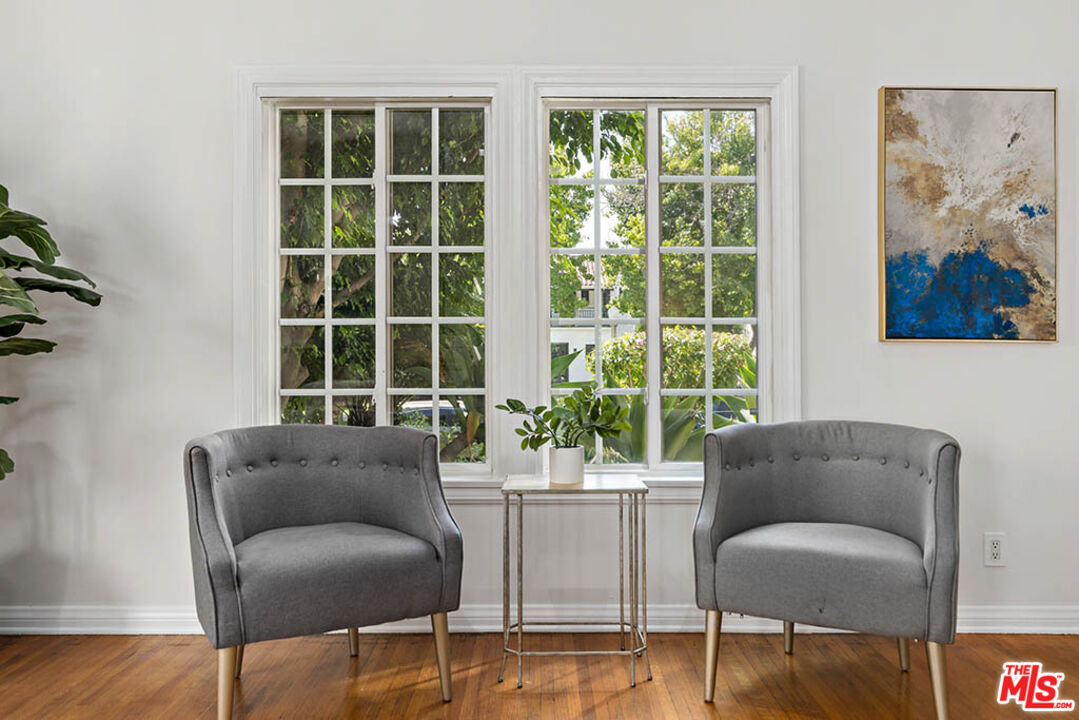 620 North Cherokee Avenue Los Angeles, CA 90004 - Photo 18 of 64 a living room with furniture and a large window