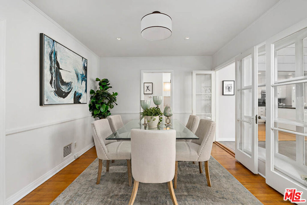 620 North Cherokee Avenue Los Angeles, CA 90004 - Photo 19 of 64 a dining room with furniture and window