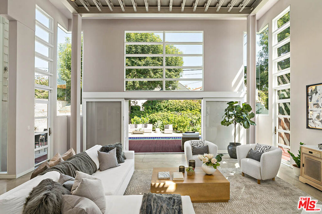 620 North Cherokee Avenue Los Angeles, CA 90004 - Photo 21 of 64 a living room with furniture and a large window