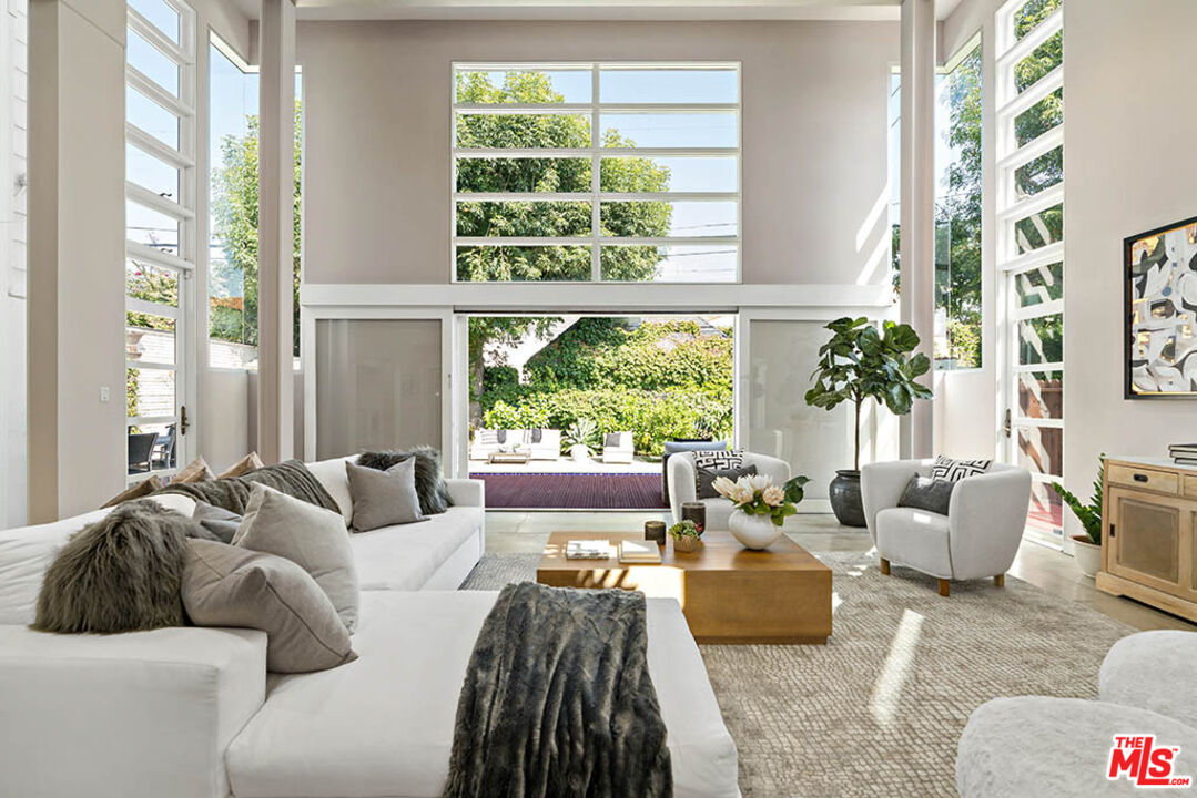 620 North Cherokee Avenue Los Angeles, CA 90004 - Photo 23 of 64 a living room with furniture and a large window