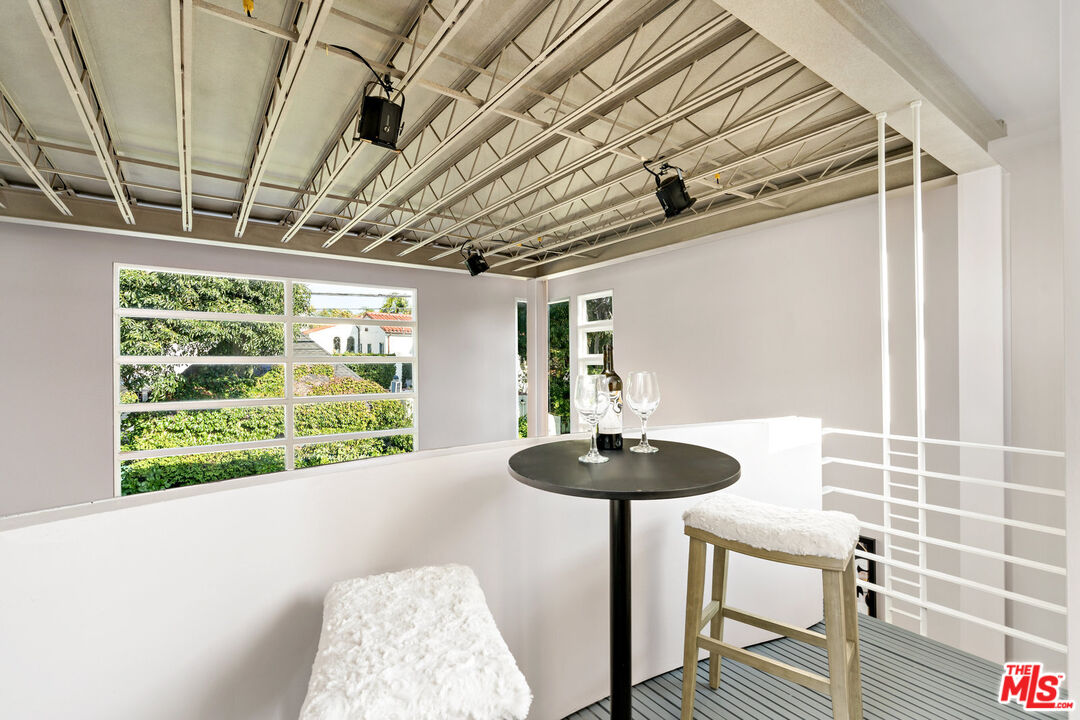 620 North Cherokee Avenue Los Angeles, CA 90004 - Photo 36 of 64 a room with furniture and a large window