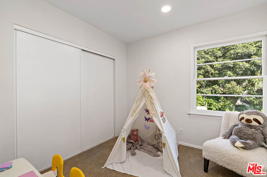 620 North Cherokee Avenue Los Angeles, CA 90004 - Photo 50 of 64 a view of a livingroom with furniture and windows