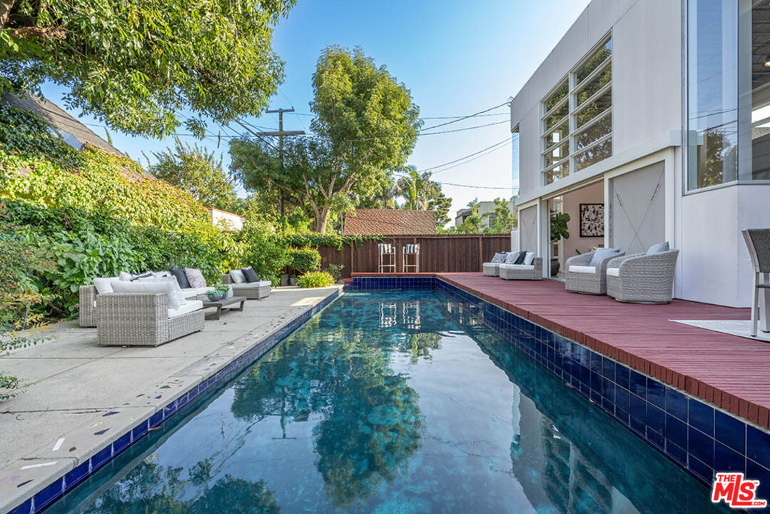 620 North Cherokee Avenue Los Angeles, CA 90004 - Photo 60 of 64 a view of a house with a yard