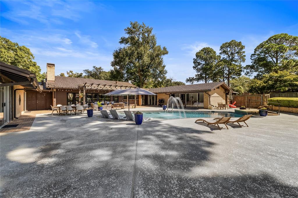 1300 Montclair Street Longview, TX 75601 - Photo 34 of 39 View of swimming pool with a patio and outdoor dining area