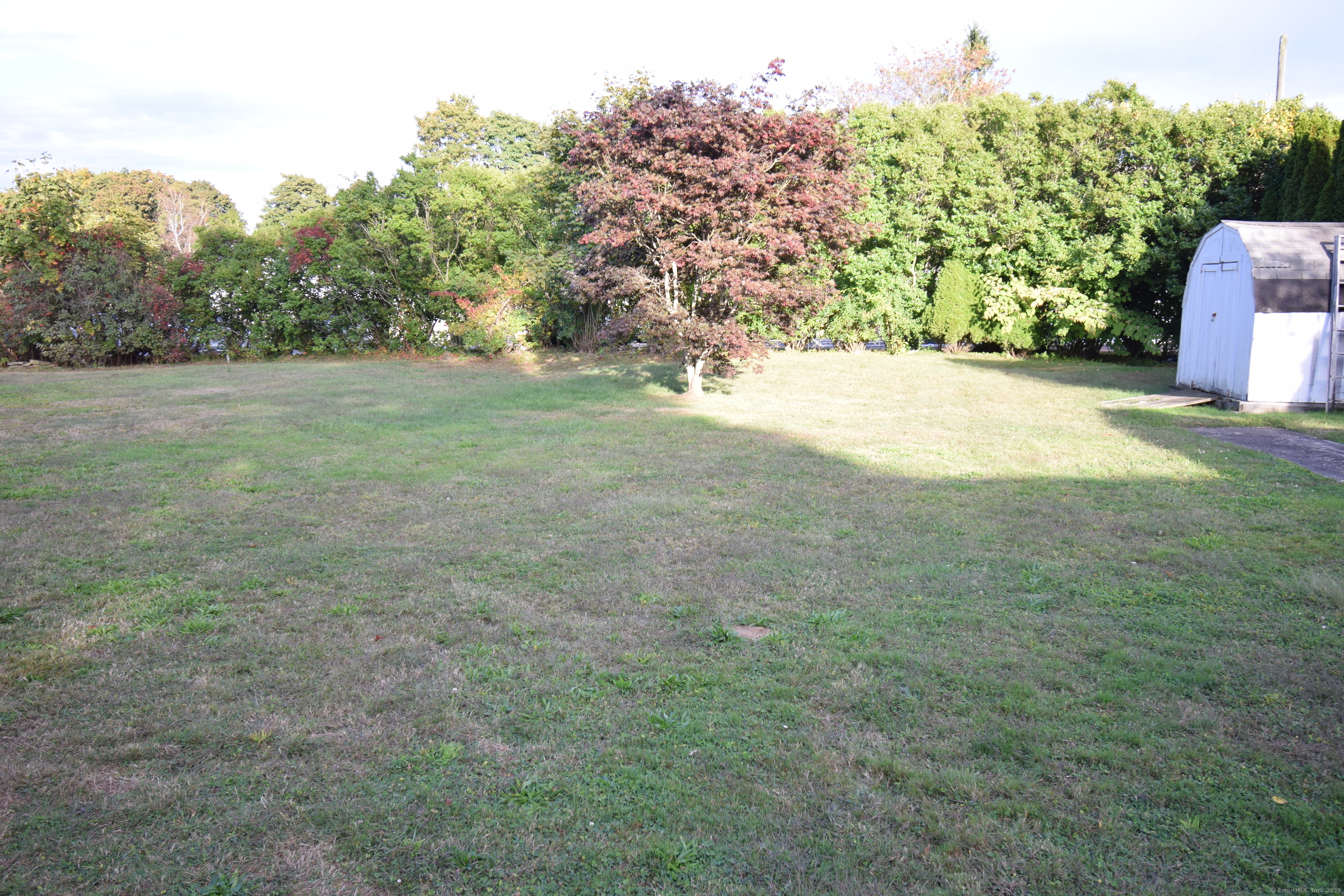 37 Dudley Lane, Unit 6 Madison, CT 06443 - Photo 7 of 12 a view of outdoor space and yard
