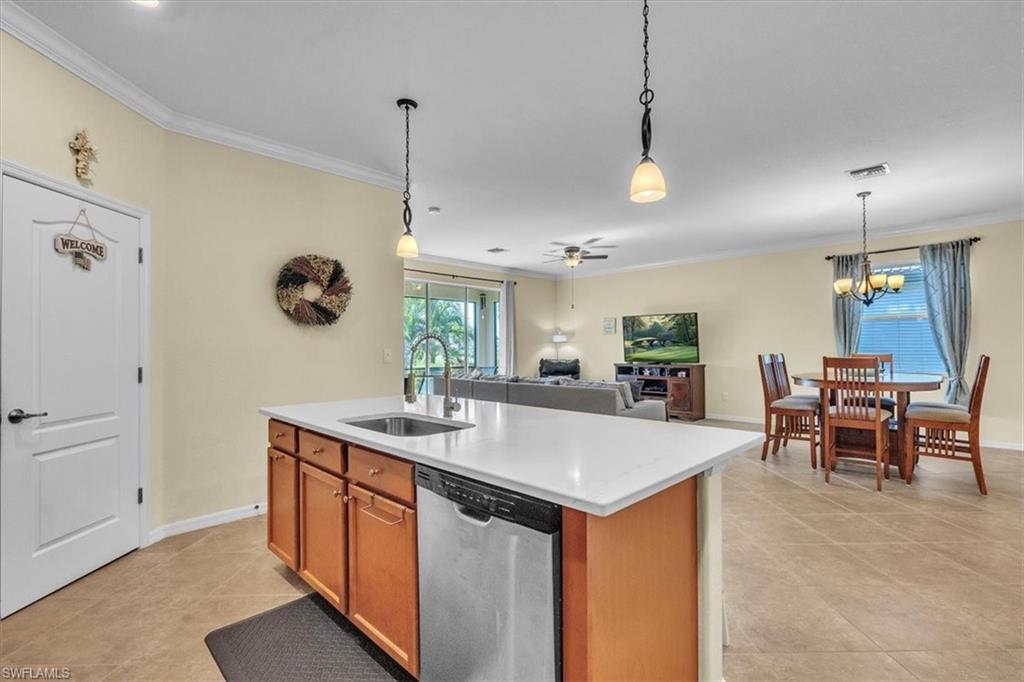3112 Walnut Grove Lane Alva, FL 33920 - Photo 15 of 50 a kitchen with a table and chairs in it