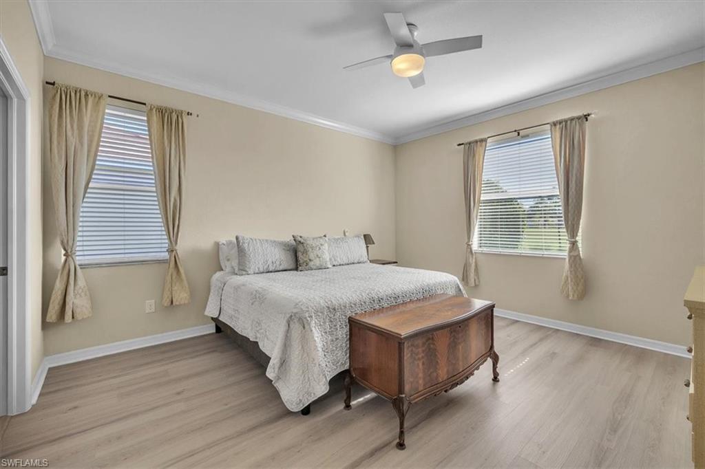 3112 Walnut Grove Lane Alva, FL 33920 - Photo 18 of 50 a spacious bedroom with a bed and a window